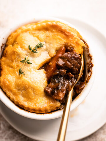 A beef pot pie in a mini dish.