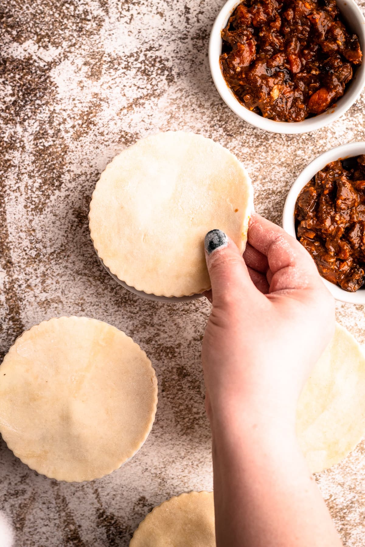 Individual beef pot pies with a pie crust top.