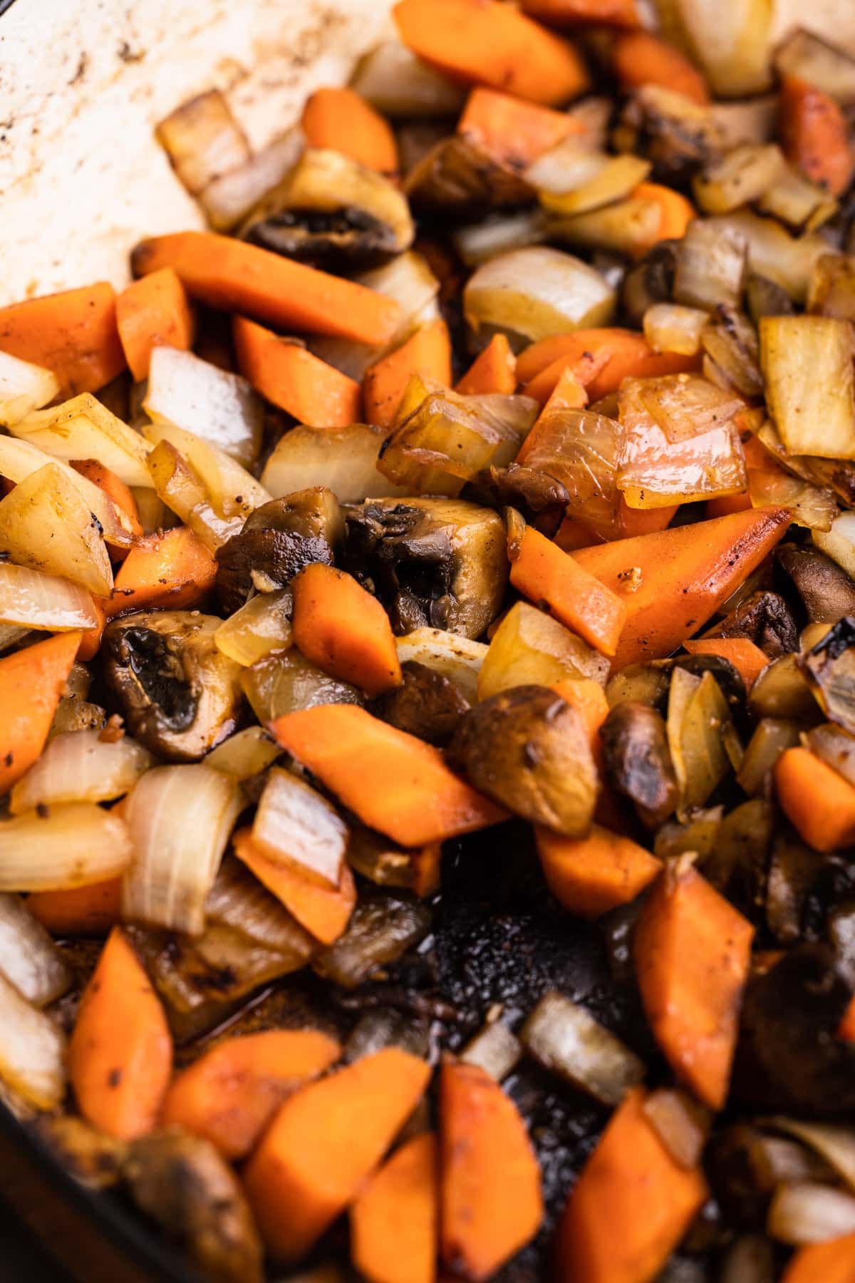 Veggies in a pot for beef pot pie.