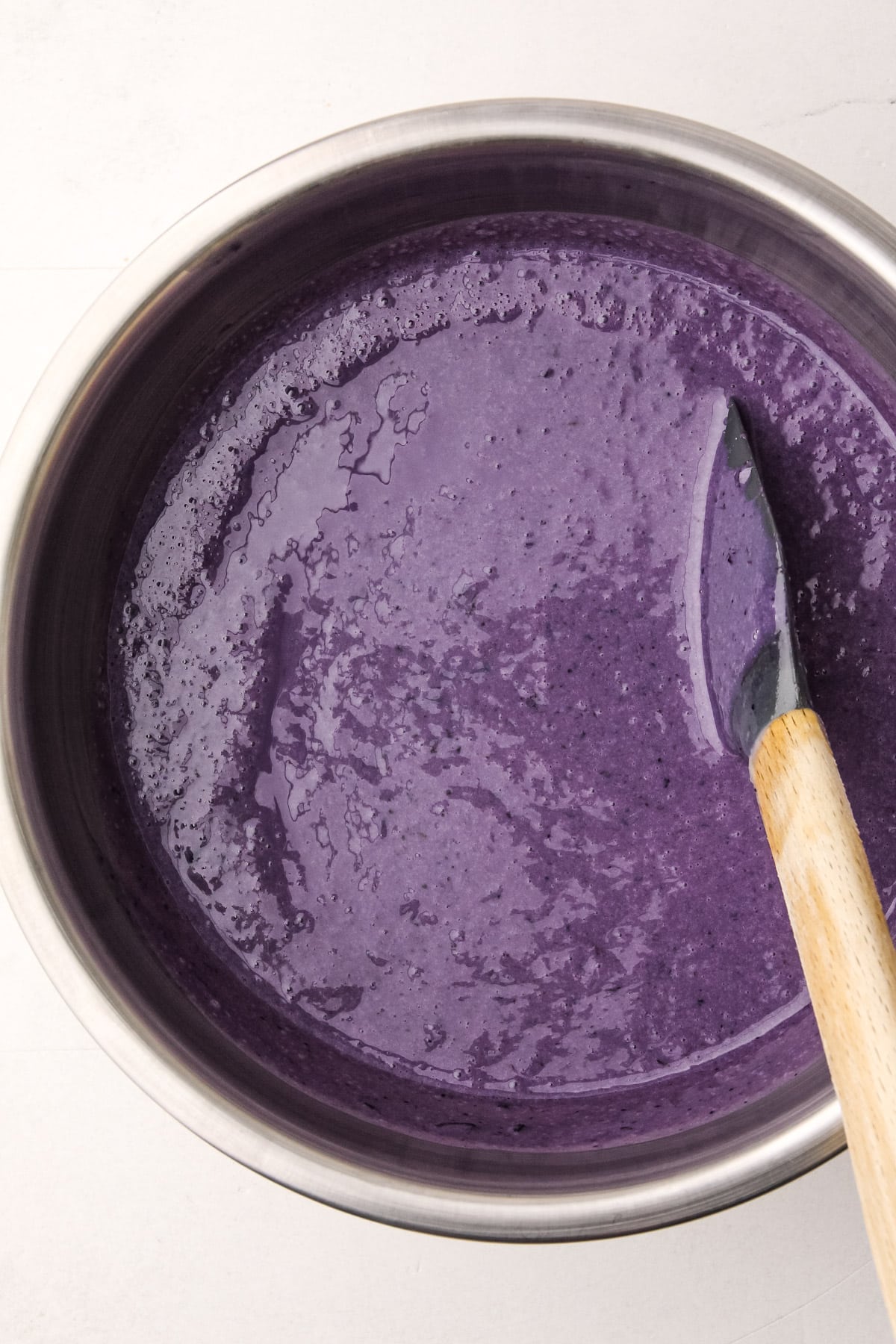 Blueberry ice cream before it is spun.