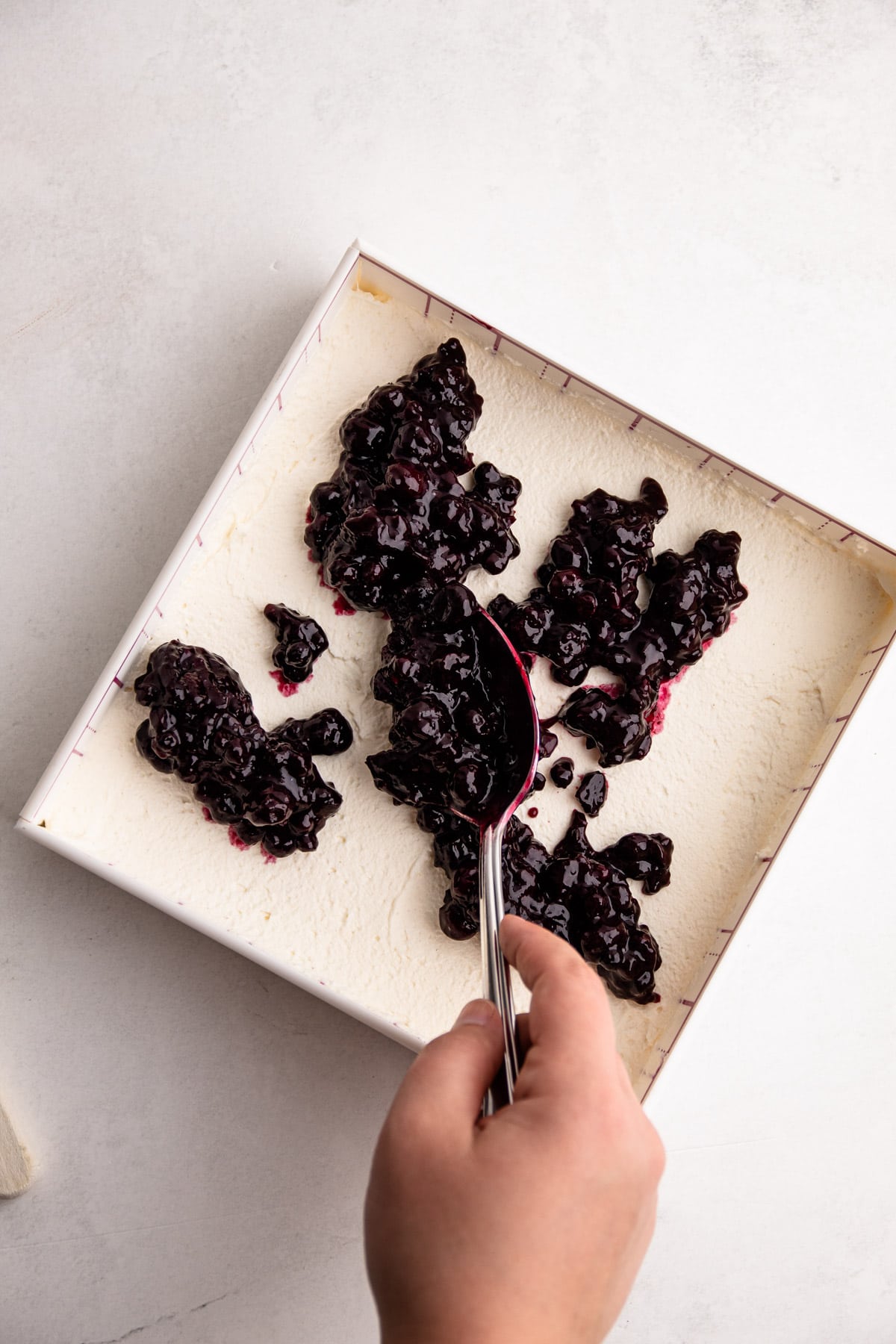 Blueberry pie filling in a layer for an icebox cake.