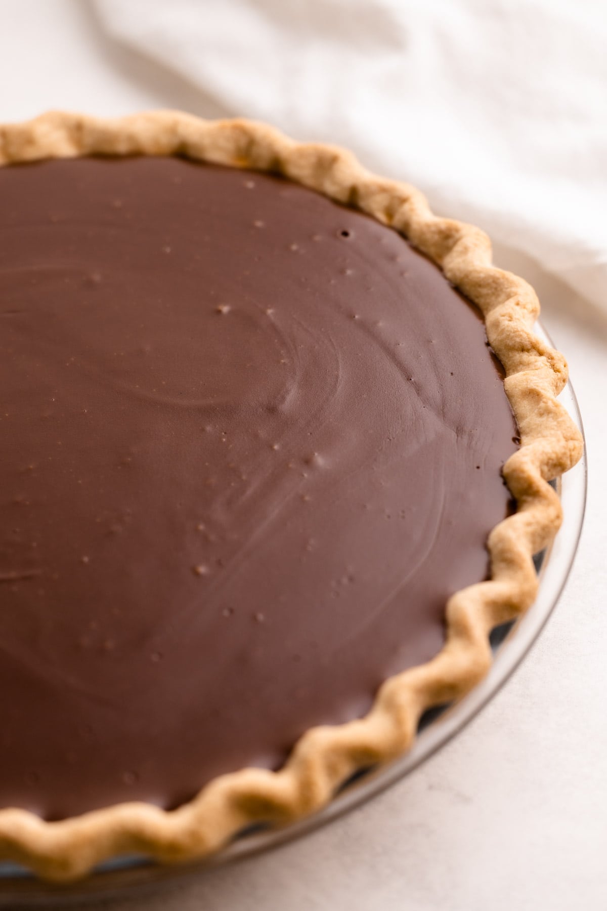 A chocolate cream pie in a pastry crust.