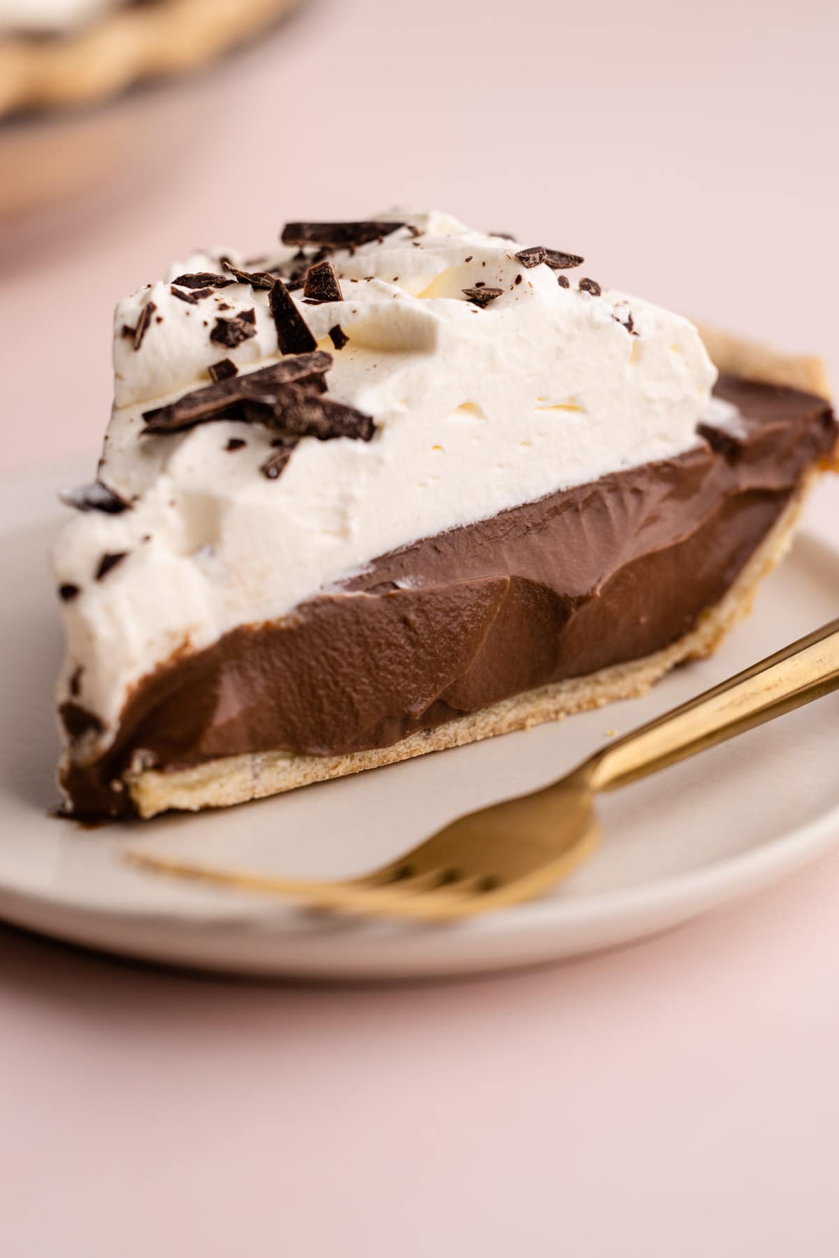 A slice of chocolate cream pie.