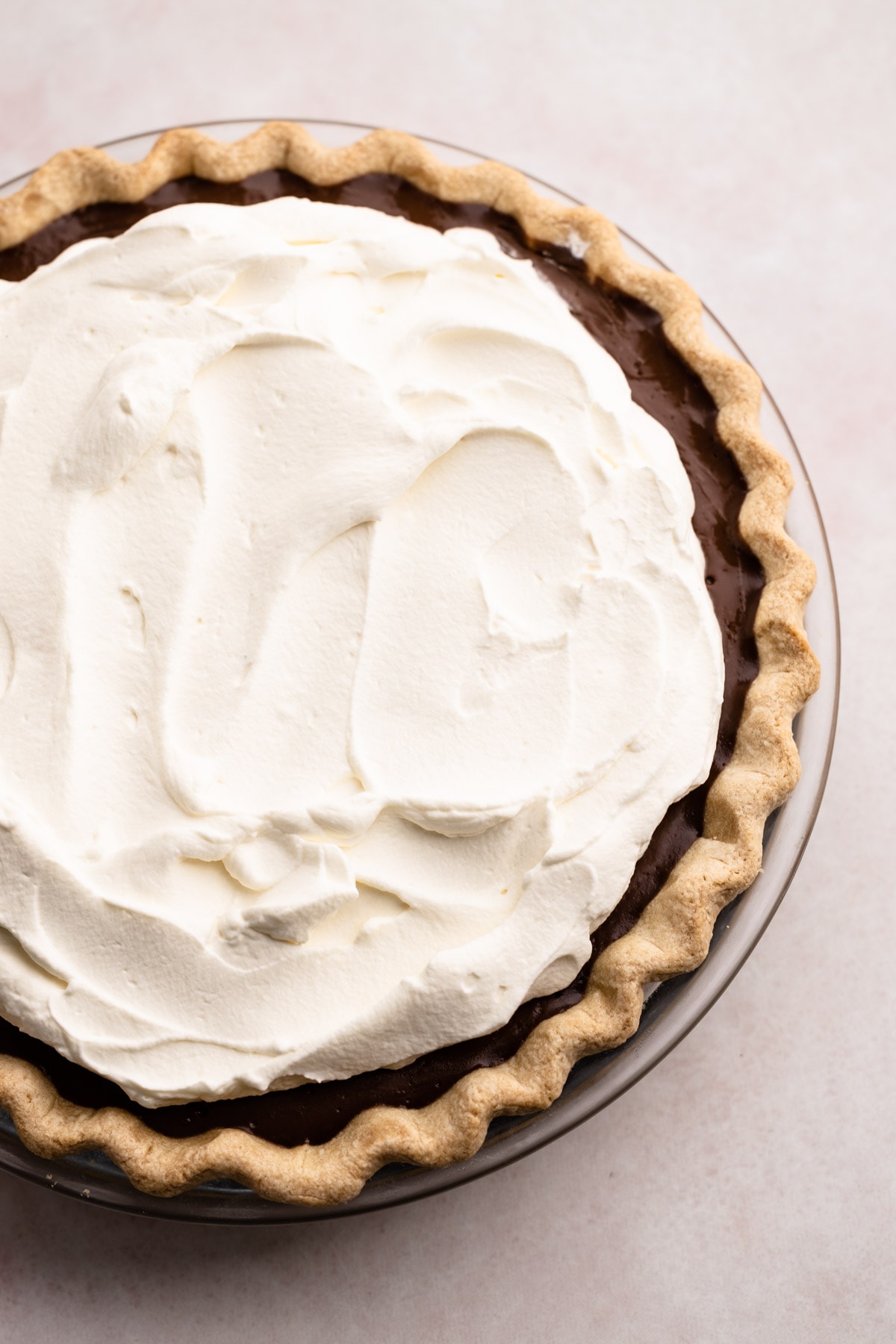 A chocolate cream pie freshly made.