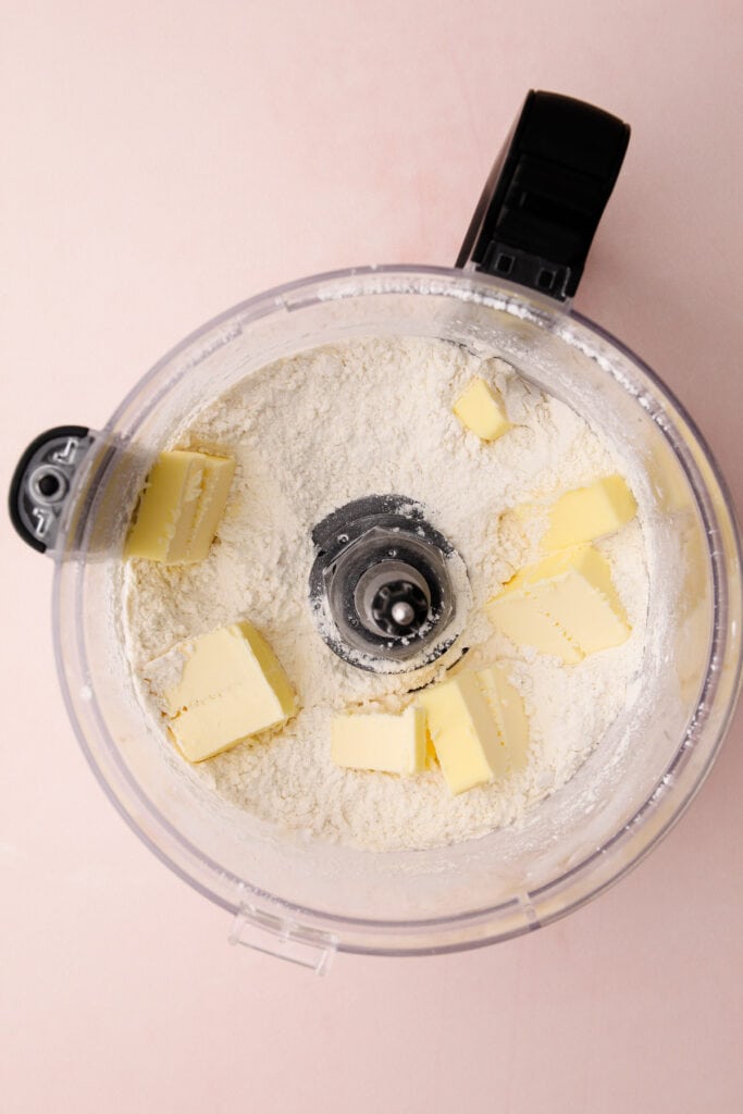 Making a sweet butter pie crust in a food processor.