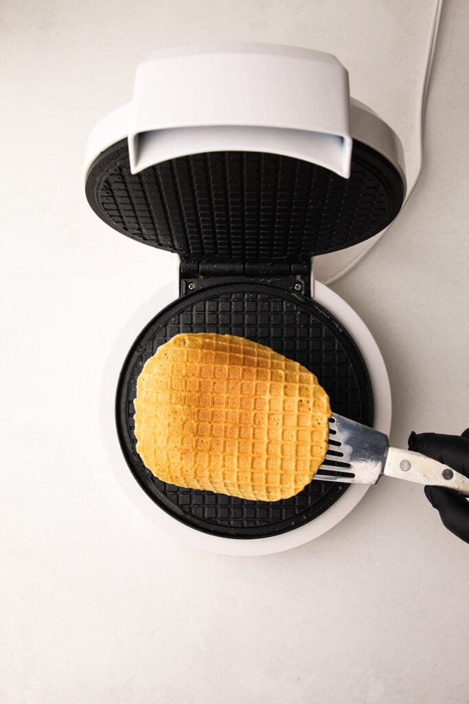 Cooking waffles for waffle cones.