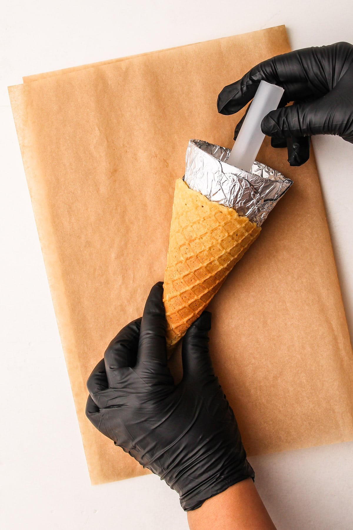Forming waffle cones.