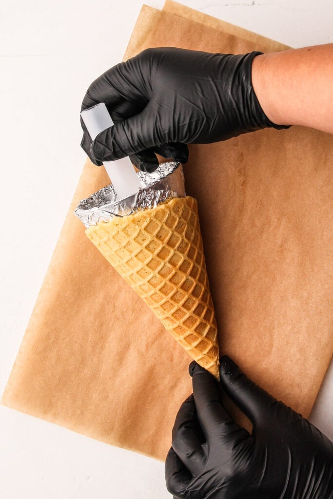 Forming waffle cones.