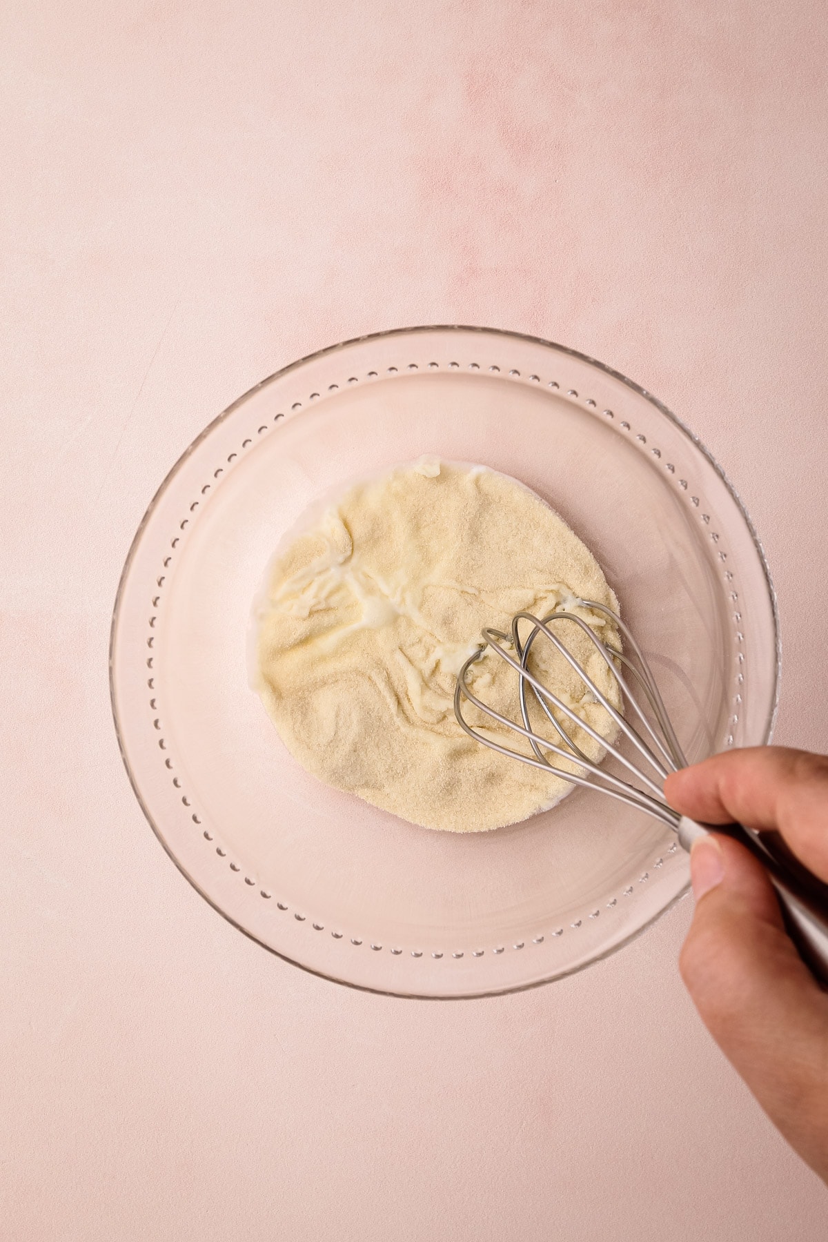 A bowl of gelatin for setting a key lime pie.