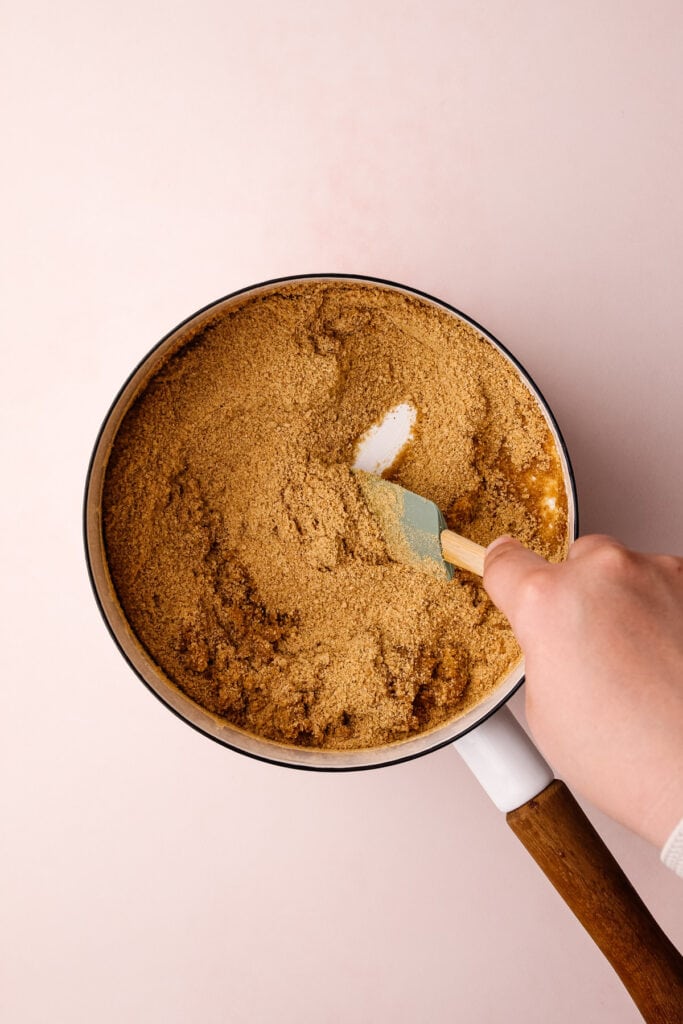 Making a graham cracker pie crust.