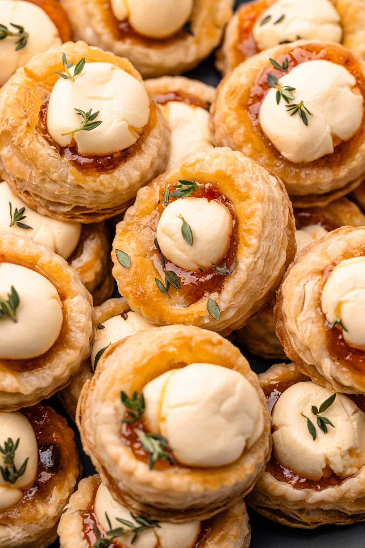 Baked puff pastry pepper jelly bites.