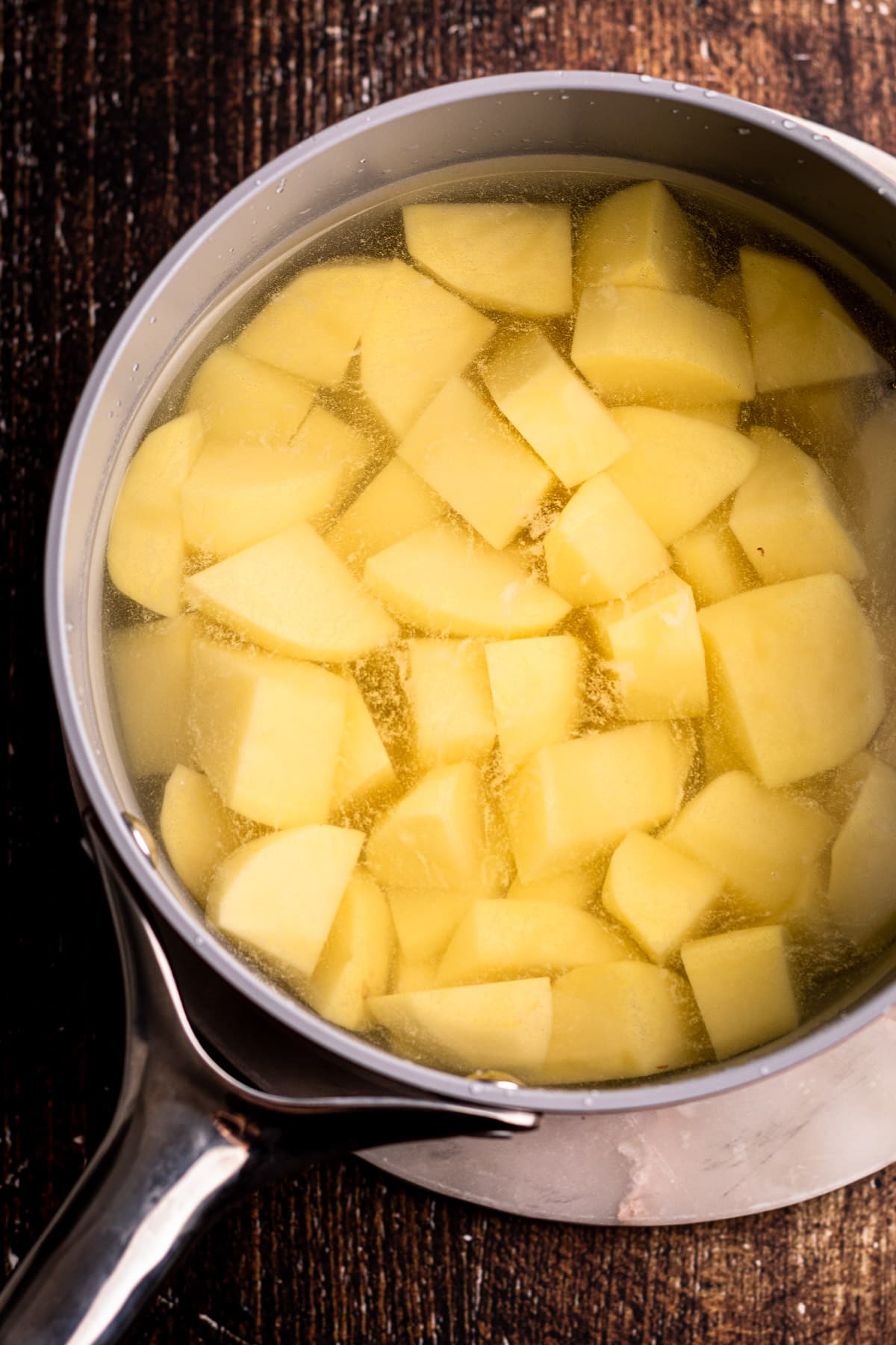 Potatoes in a pot for mashed potatoes.