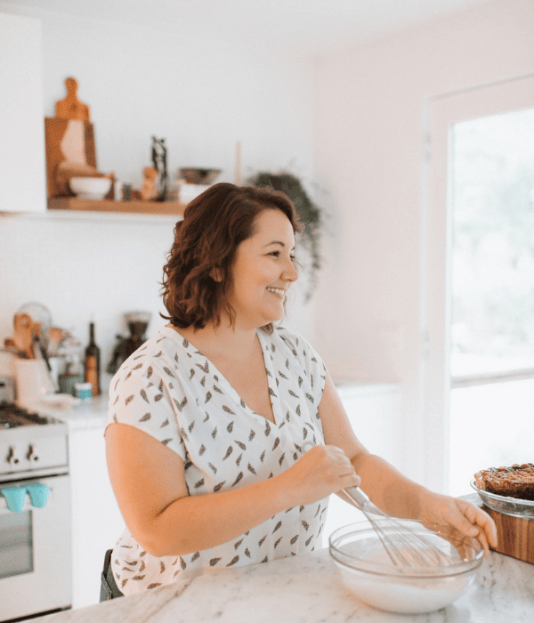 Kelli Avila, creator of Everyday Pie standing in a kitchen.